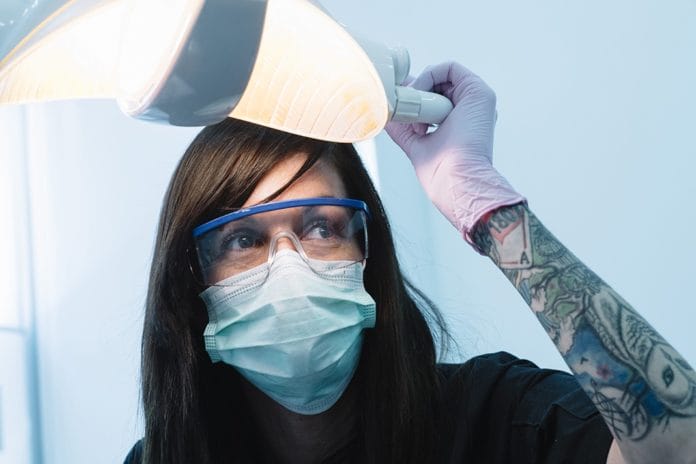 Dental Hygienist with Tattoo
